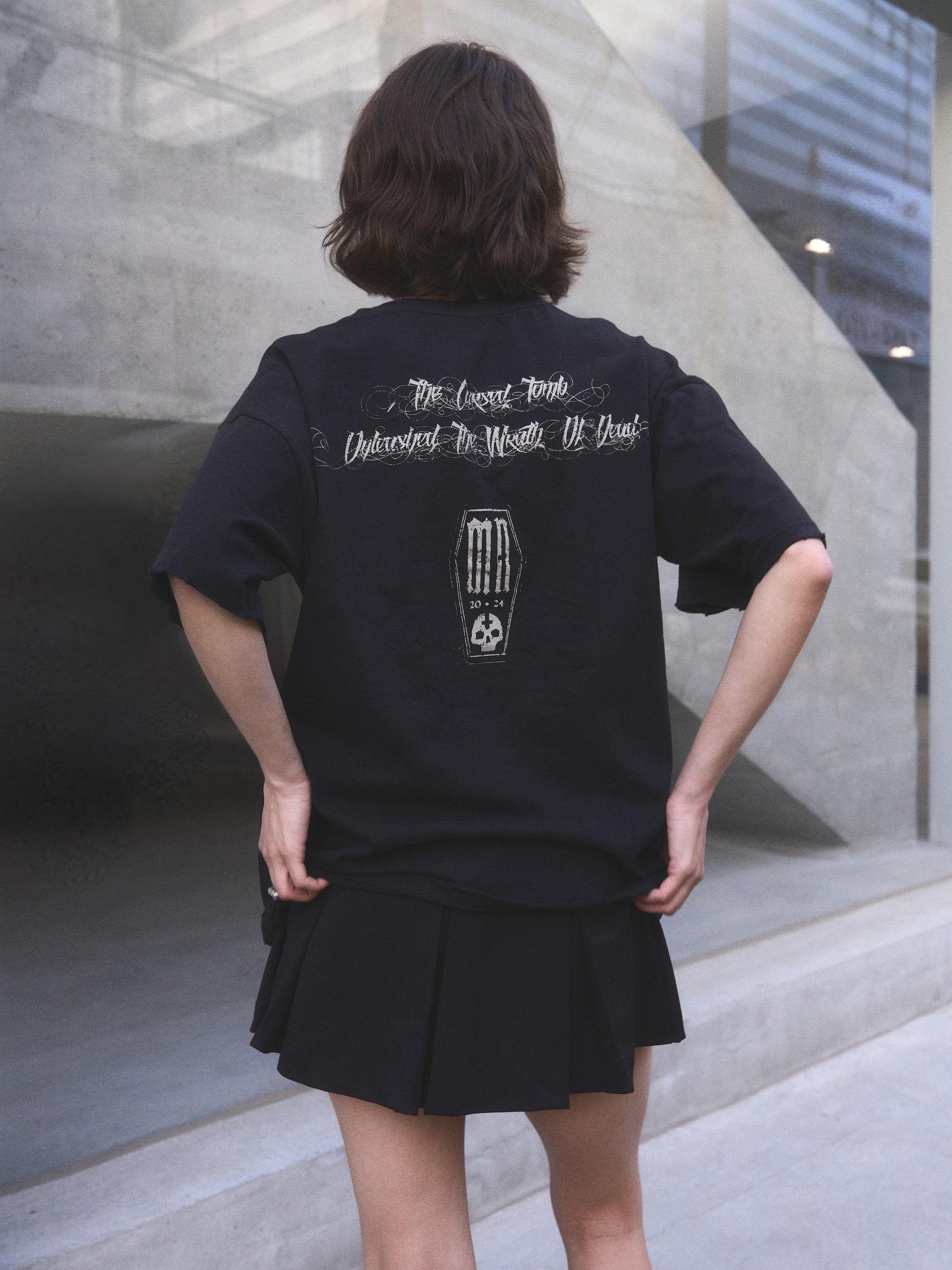 Back From Dead oversized t-shirt — lifestyle shot showing relaxed oversized fit and dark streetwear aesthetic