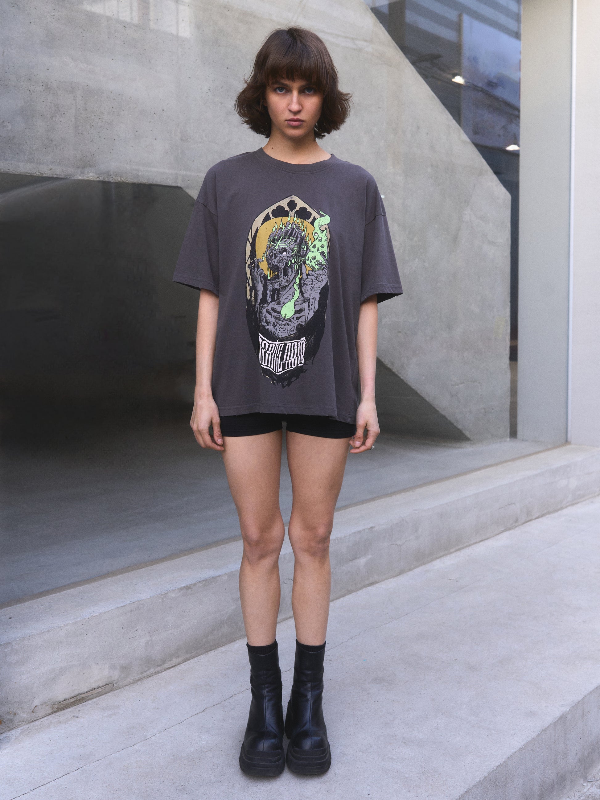 Candelabrum oversized t-shirt — front detail of skull and candle graphic with discharge print texture