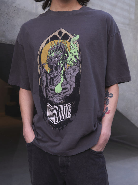 Candelabrum oversized t-shirt — title image showing discharge-printed skull and candelabrum graphic on black cotton