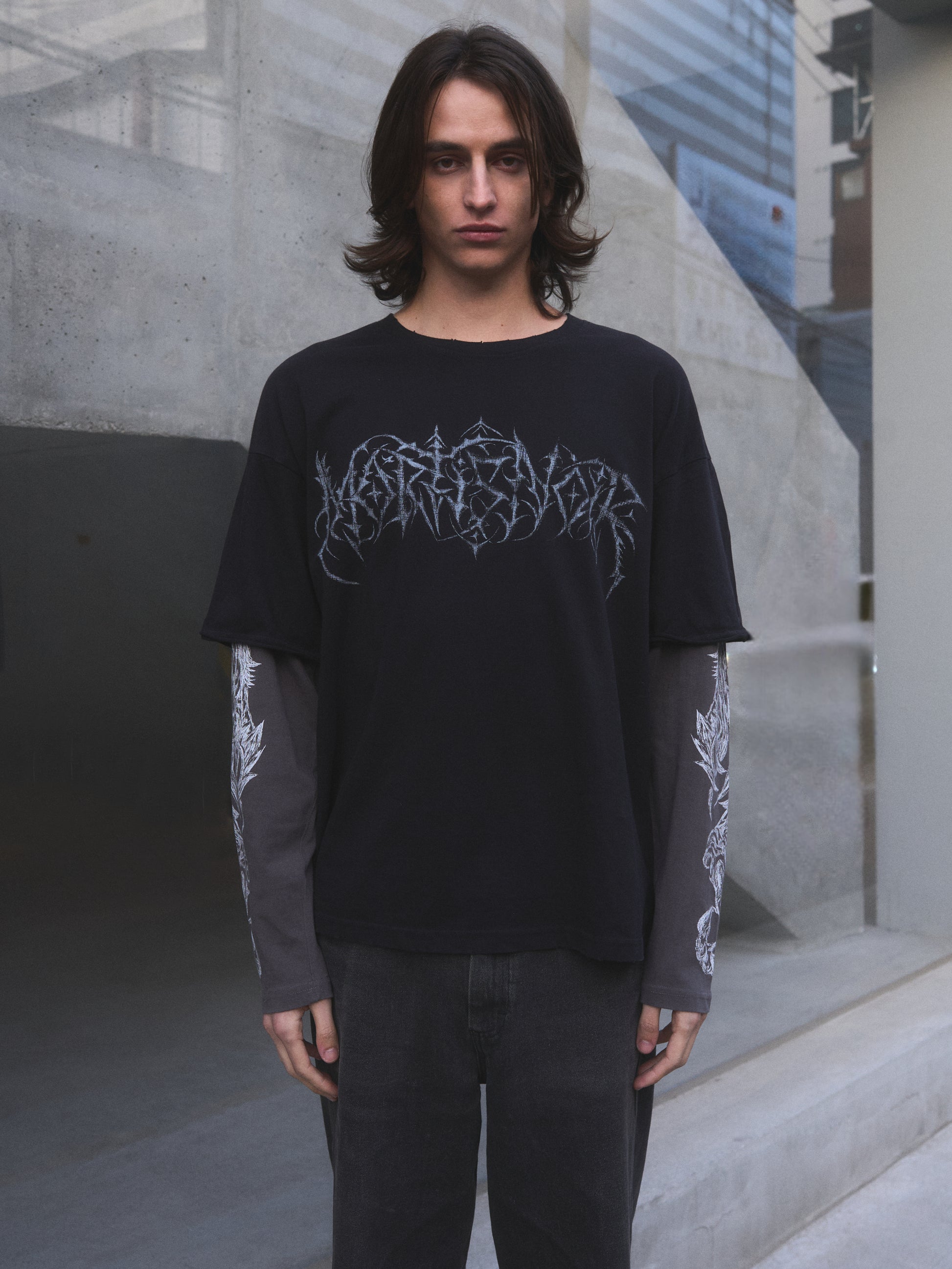 Demonic Heraldry oversized t-shirt — front detail of medieval-inspired silk-screen sigil graphic