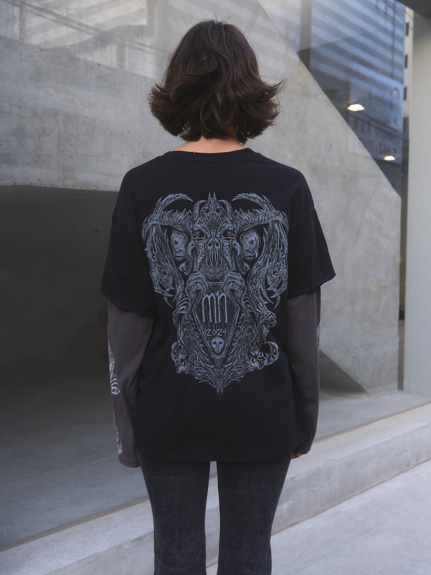 Model wearing Demonic Heraldry oversized t-shirt by Mortisnoir — full lookbook shot